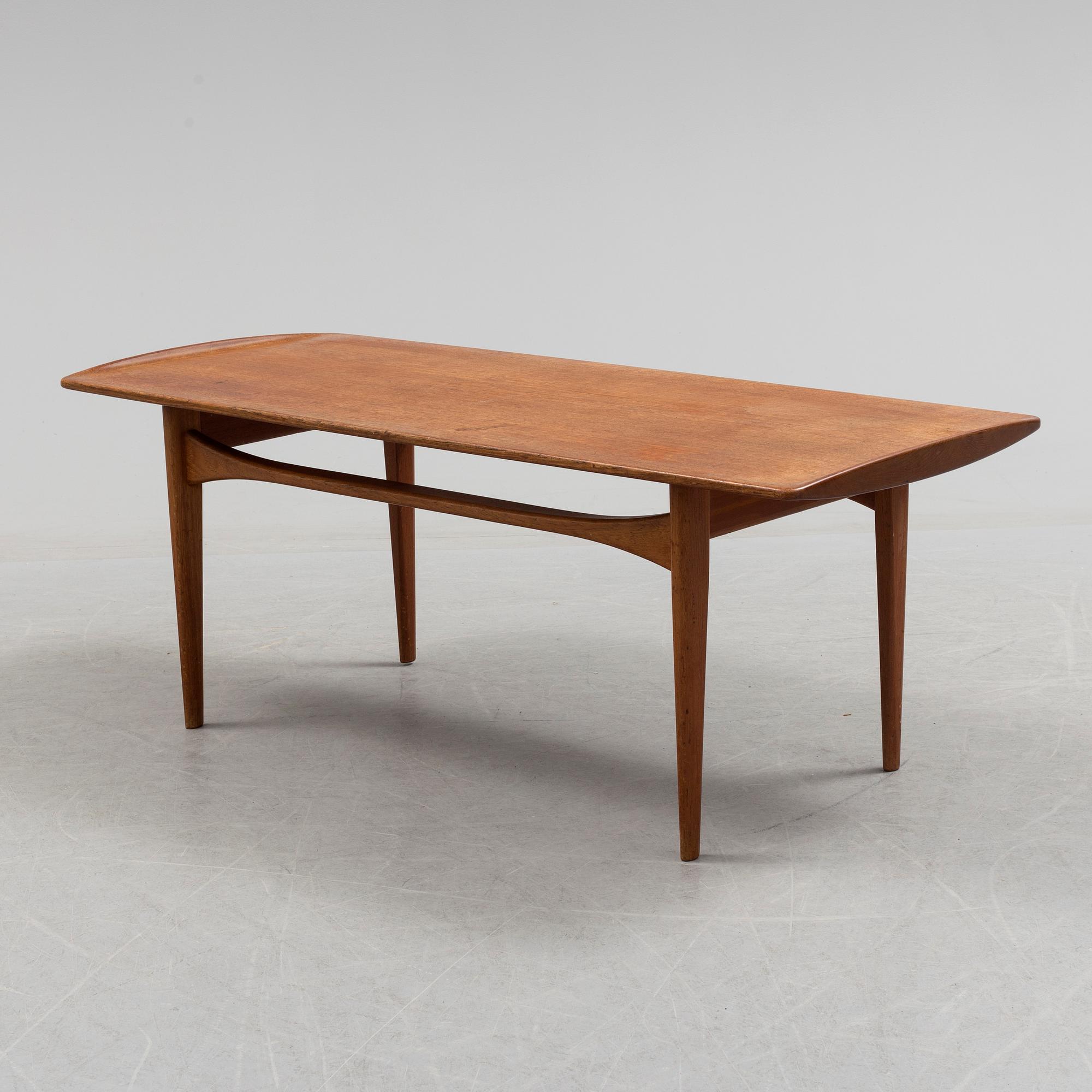 A 1950-/60´s table by Edward Kindt-Larsen France & Søn, Denmark.