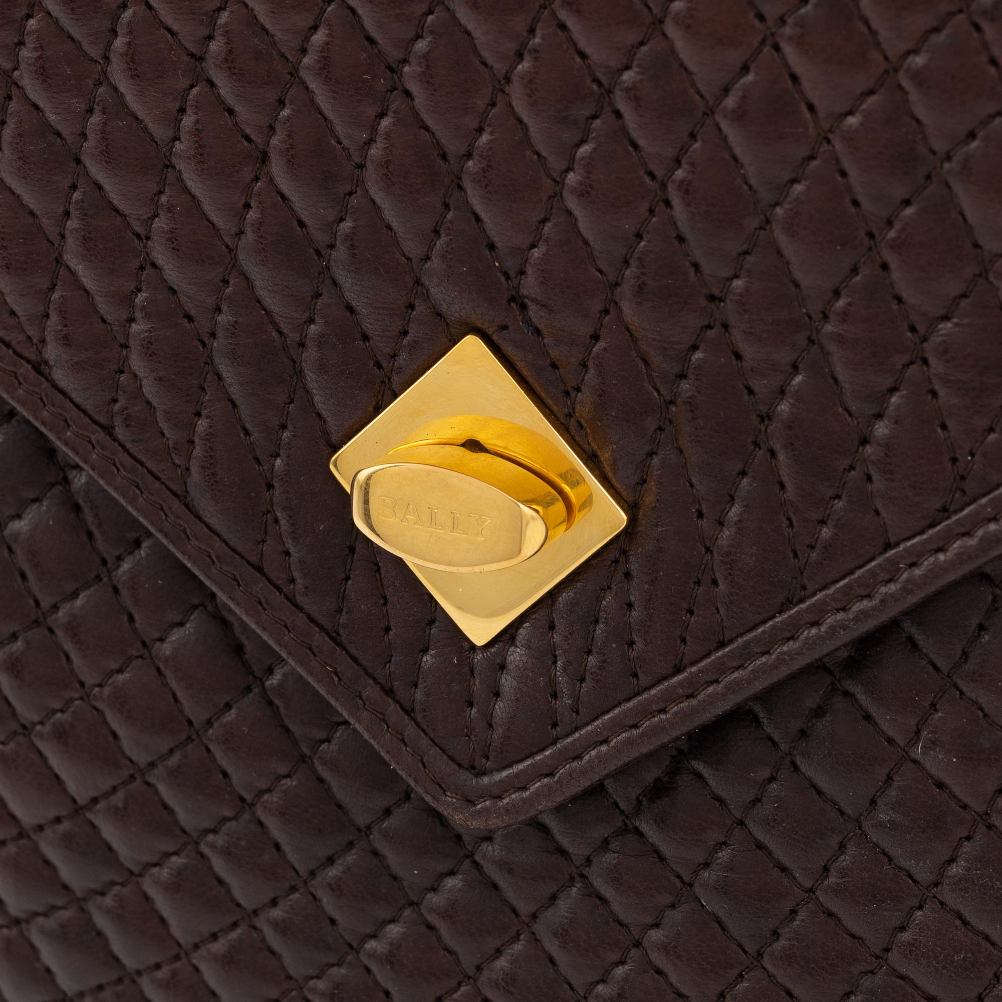 Bally, a brown leather bag.