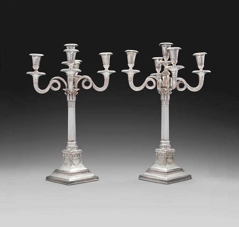 CHANDELAIRS, a pair. Silver. Germany, turn of century 18/1900. Height 47 cm. Total weight filling included 4085 g.