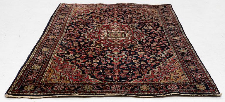 A semi-antique Sarouk rug, west Persia, c. 205 x 131 cm.