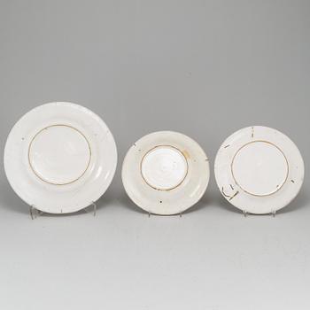 A Swedish faience serving dish and six plates, 18th Century.