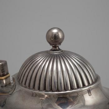A FOUR PIECE SILVER TEA- AND COFFEE SERVICE, first half of the 20th century. Total weight ca 1300 g.