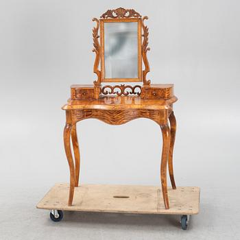 A Rococo revival dressing table, later part of the 19th Century.