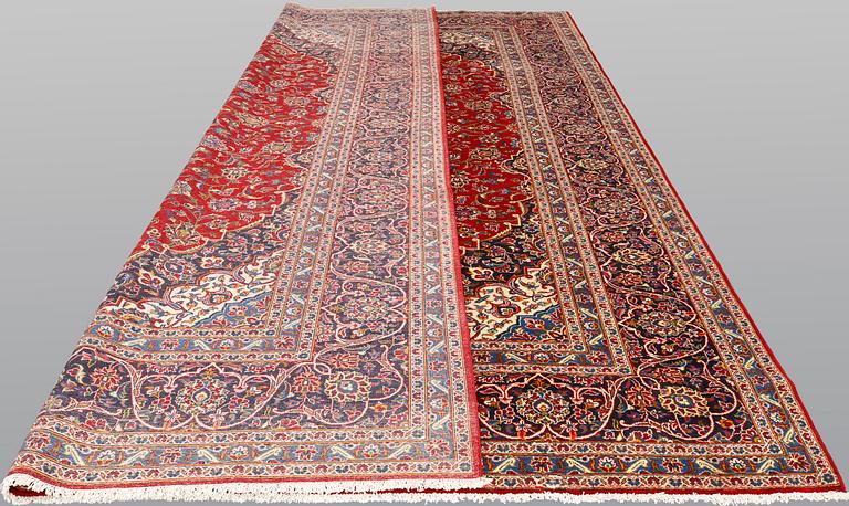 A Keshan carpet, 398 x 298 cm.