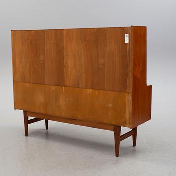 A teak veneered cabinet, 1960's.