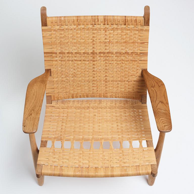 Hans J. Wegner, an oak "CH-27" easy chair, Carl Hansen & Son, Denmark, 1950-60's.