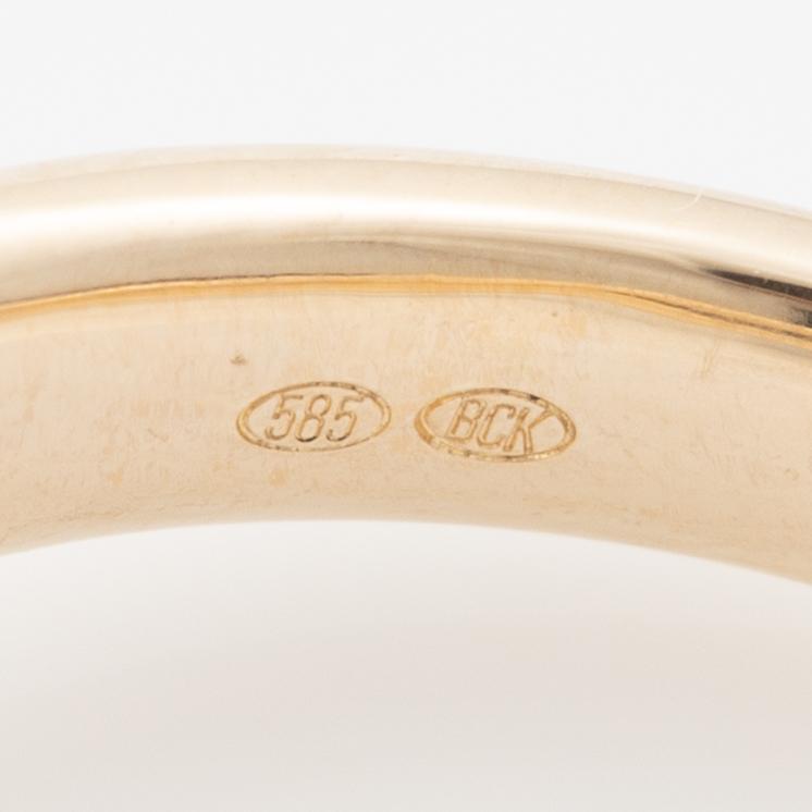 Ring 14K guld med droppslipad diamant, medföljande IGI report.