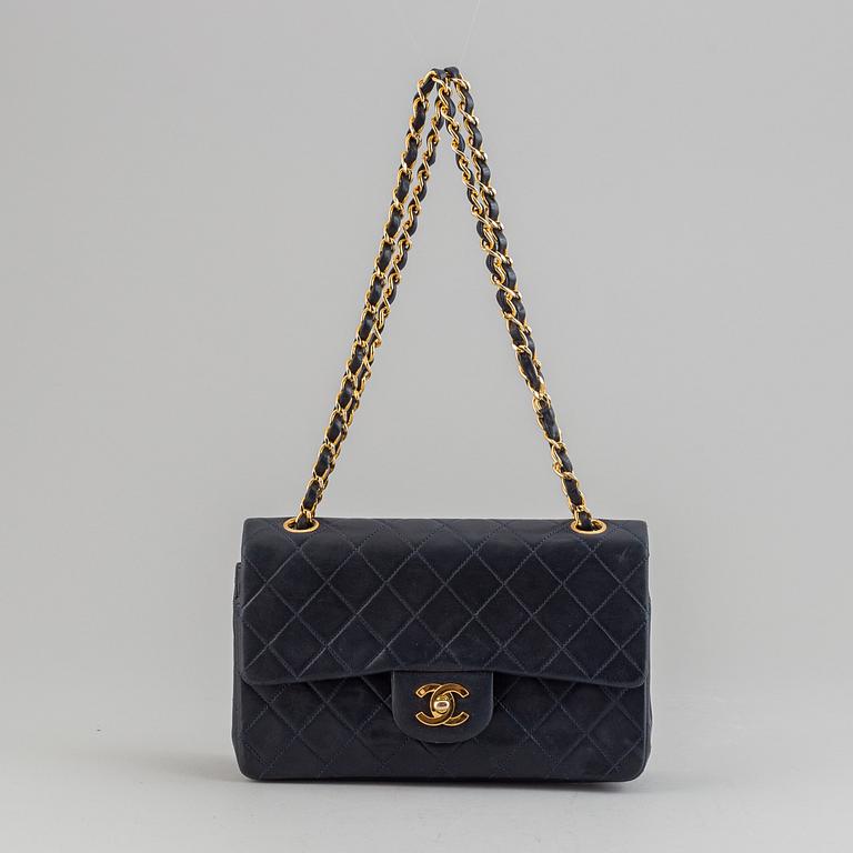 Chanel, a navy leather 'Double Flap Bag', 1989-91.