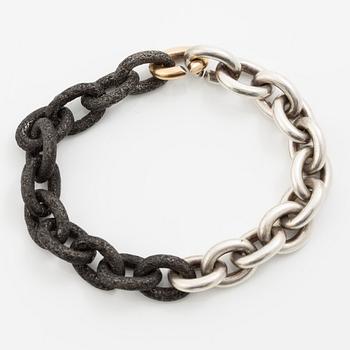 Mikael Hamma, a bracelet 18K gold, sterling silver and oxidised iron, Stockholm 1996.