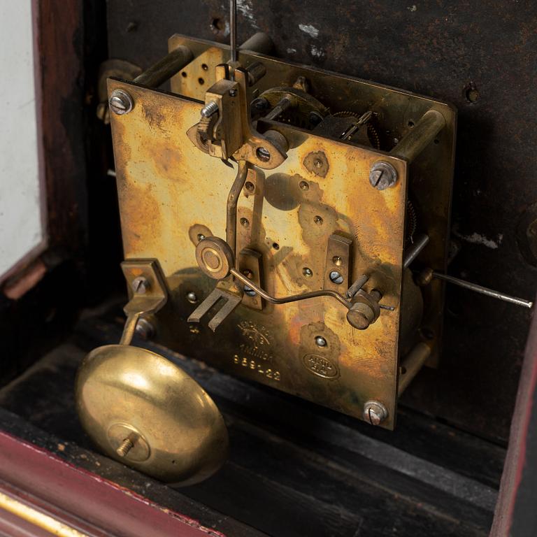 An 18th century table clock.