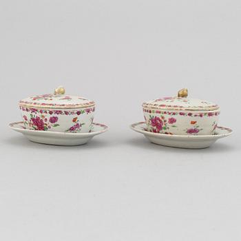 A pair of famille rose export porcelain butter tureens with dishes and covers, Qing dynasty, Qianlong (1736-95).