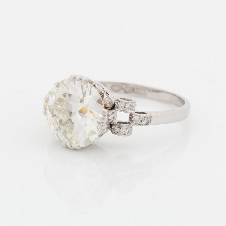 A platinum ring set with an old-cut diamond weight ca 3.00 cts quality ca J/K vs.