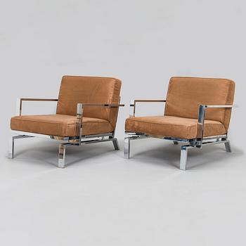 A pair of  21st century armchairs for Innovation.