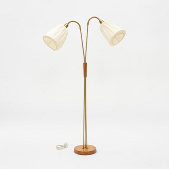 A brass and teak floor light, 1950's.