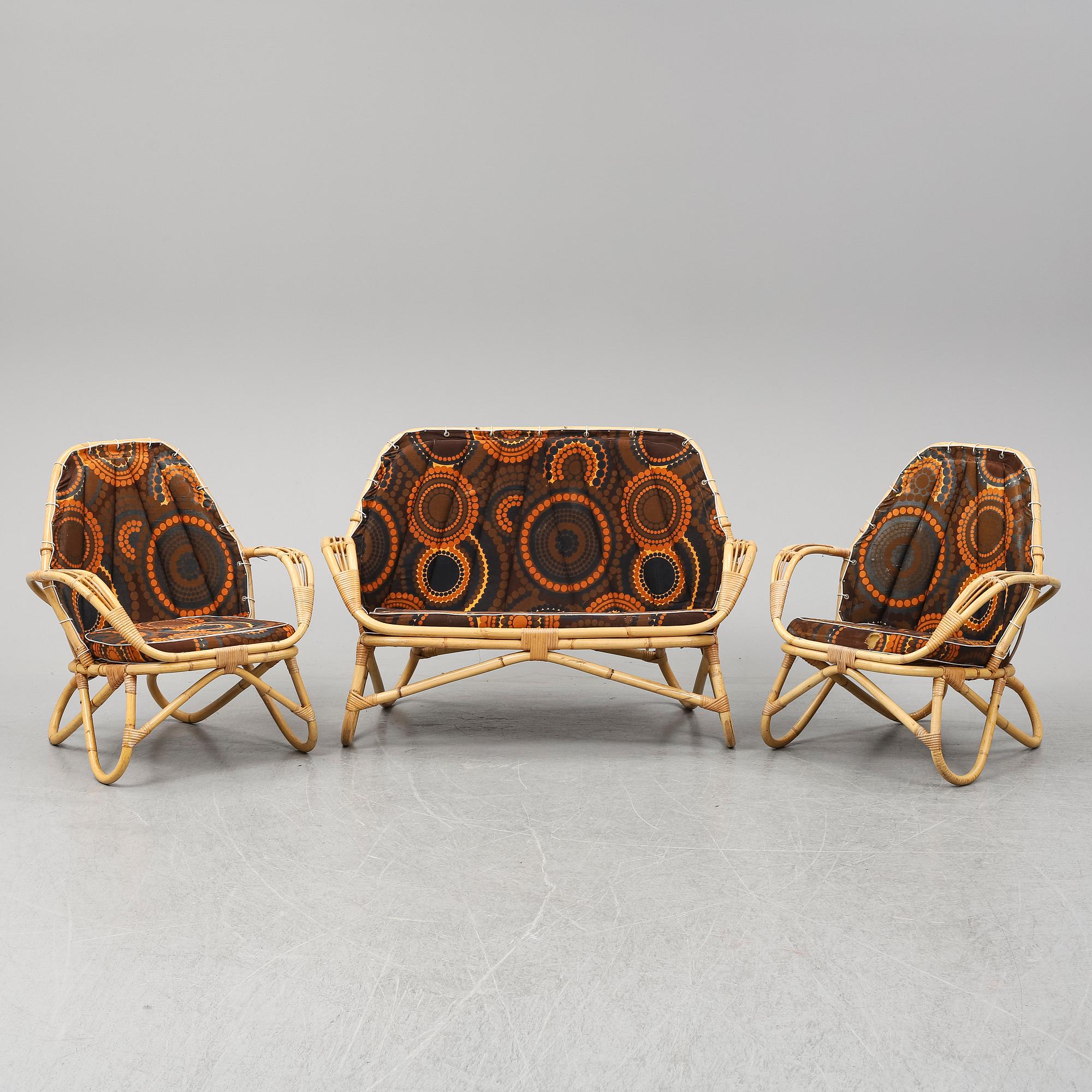 A sofa and two easy chairs, 1960s.