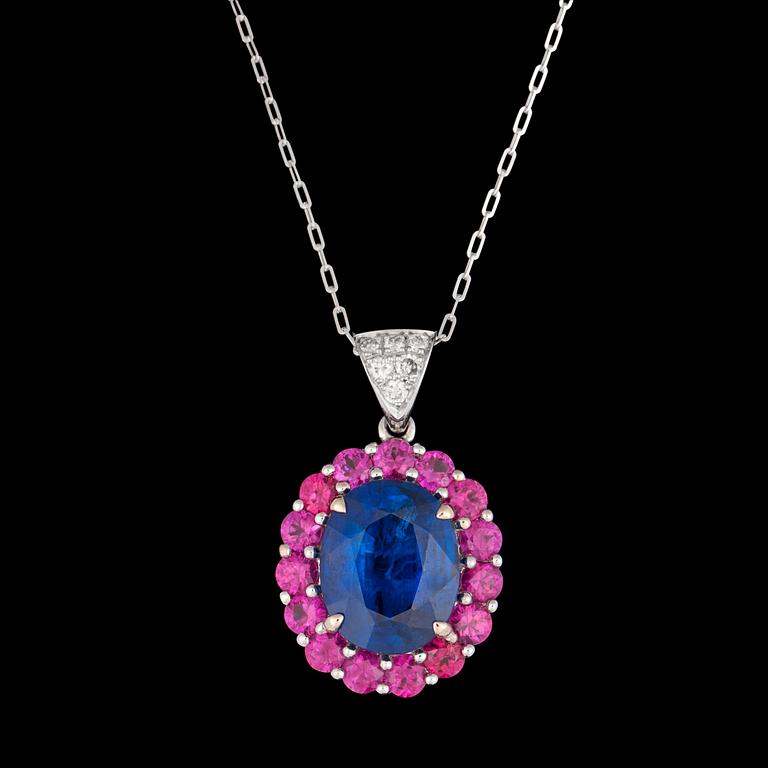 A blue kyanite, 5.70 cts, rubies, tot. 1.93 cts, and brilliant cut diamond pendant, tot. 0.13 cts.