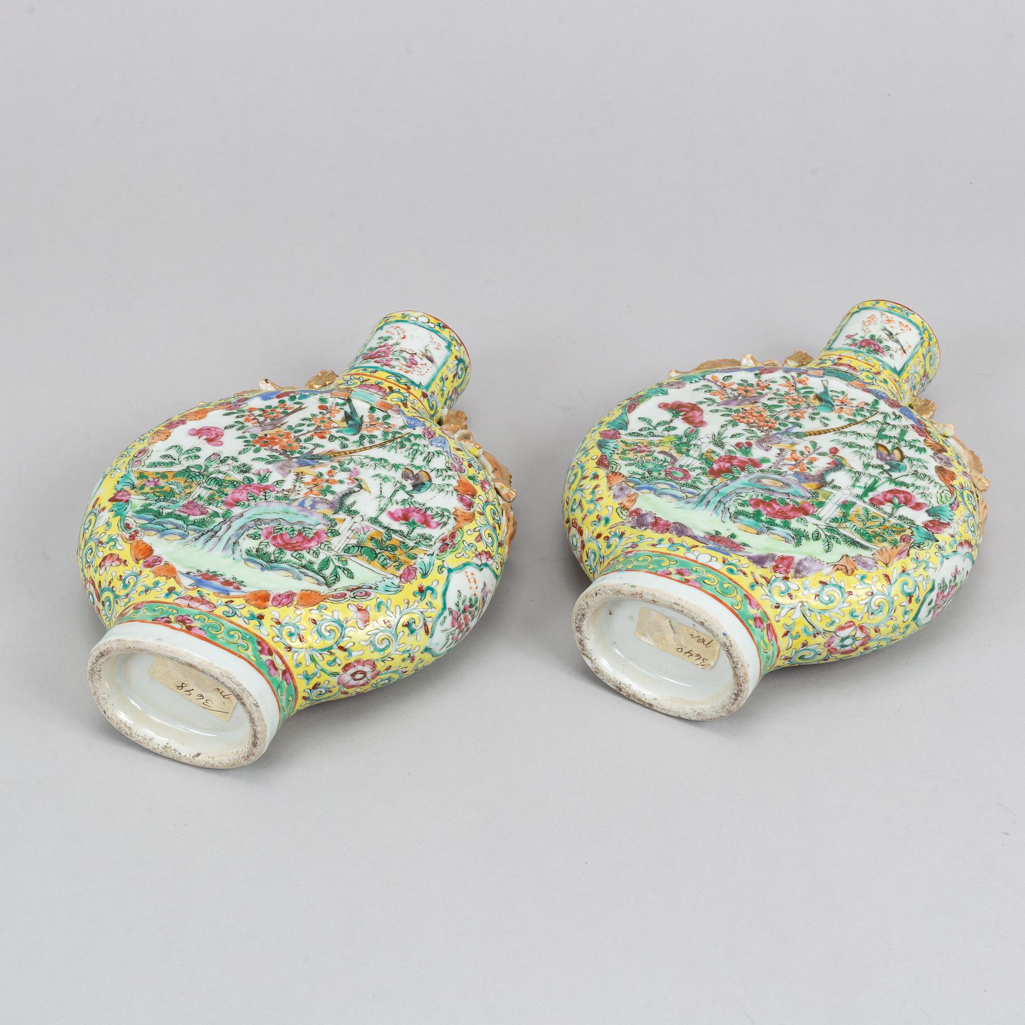 A pair of famille rose Canton moon flasks, late Qing dynasty, 19th Century.