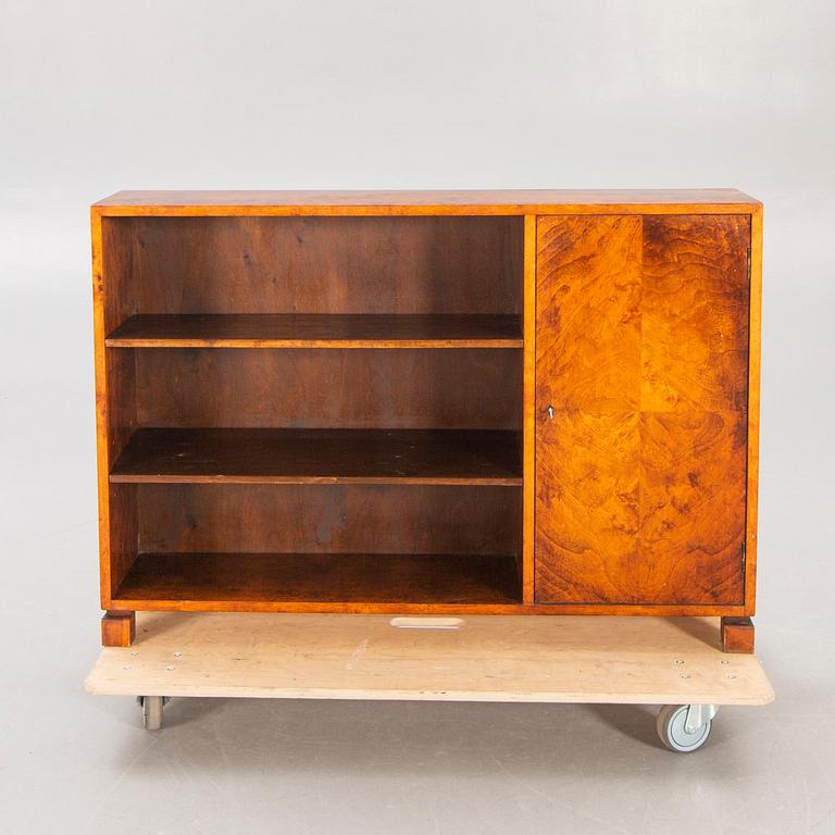 A 1930s birch bookcase.