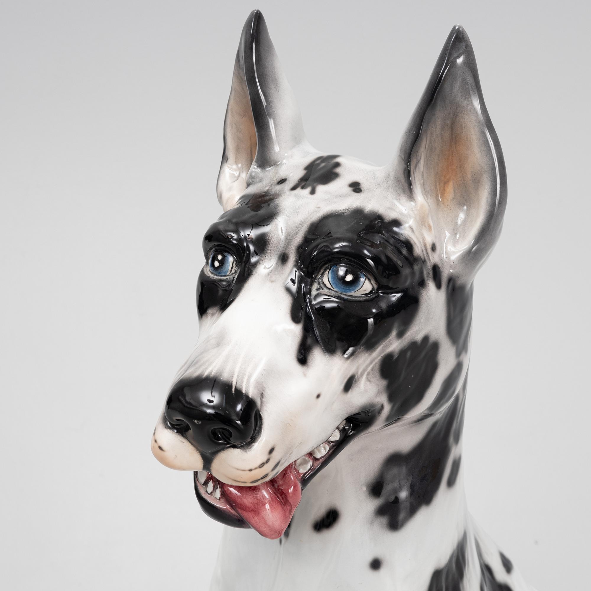 A ceramic decorative sculpture of a dog, late 20th Century.