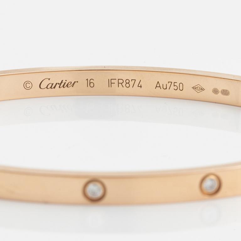 A Cartier "Love" bracelet small model in 18K rose gold with ten round brilliant-cut diamonds.