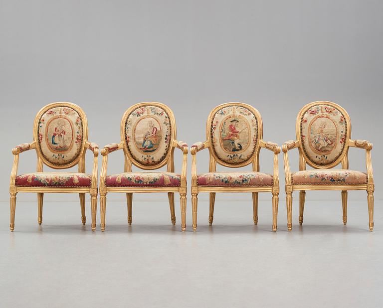 A set of four Louis XVI armchairs.