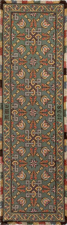 Sled cushion, dated 1938, approx. 180 x 52 cm.