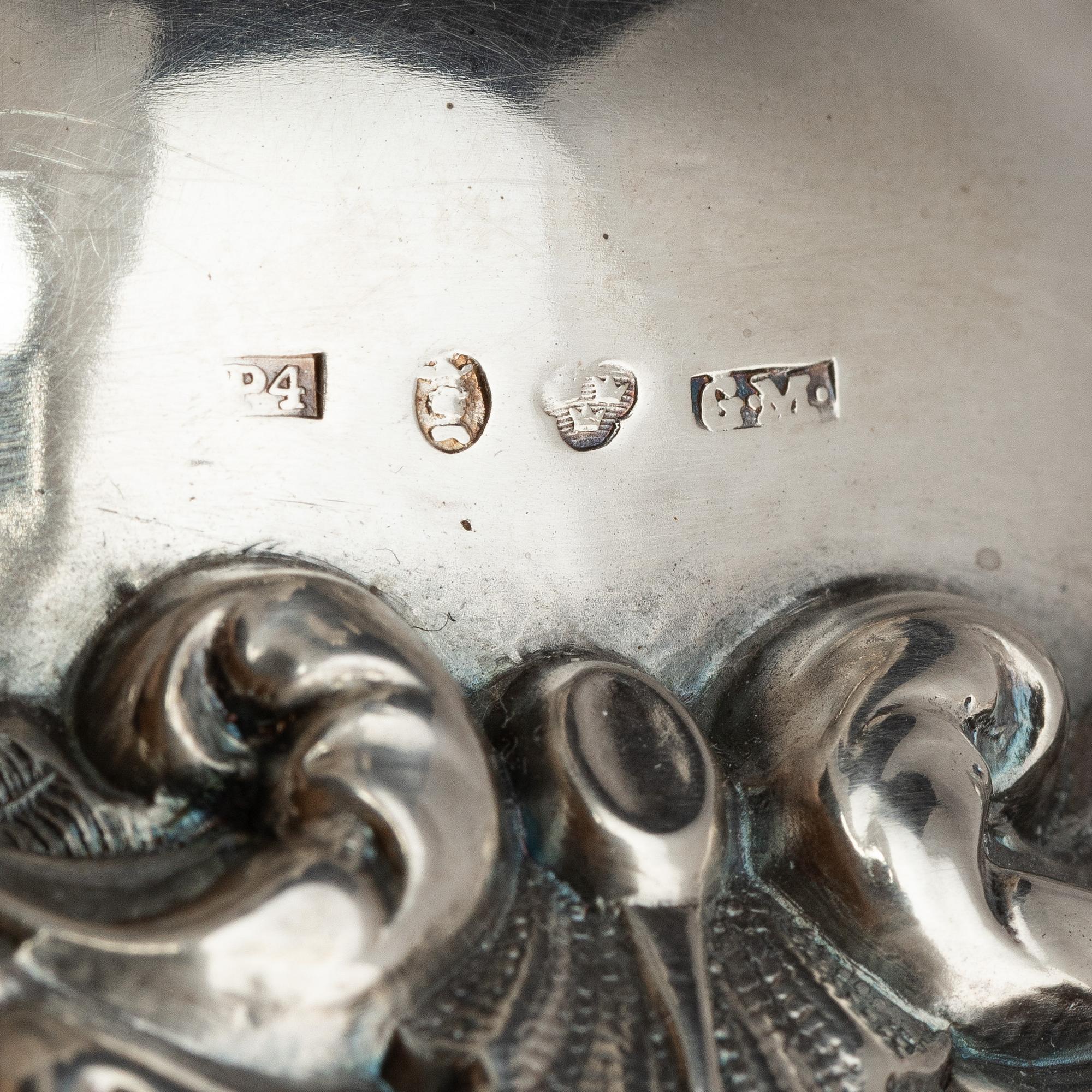 A pair of silver candlesticks, marks Gustaf Möllenborg, Stockholm 1845.