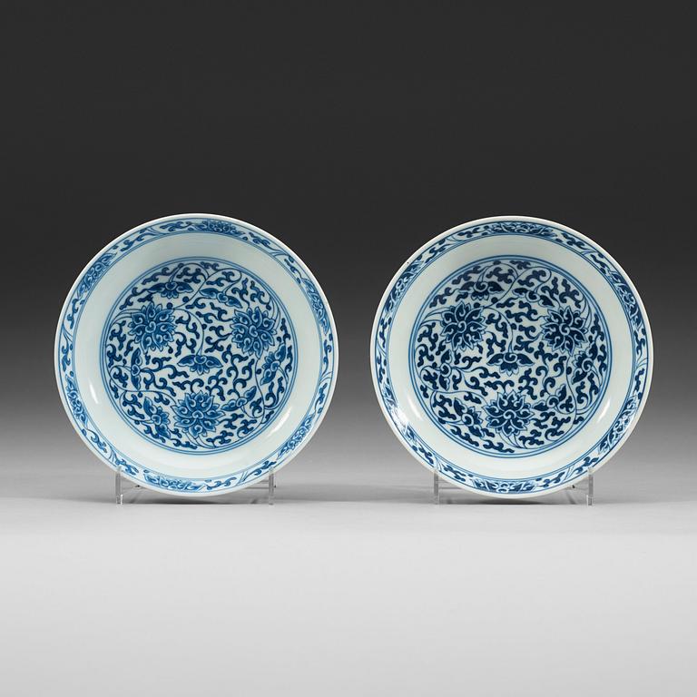 A pair of blue and white lotus dishes, Qing dynasty, 19th Century with Daoguangs seal mark and period.