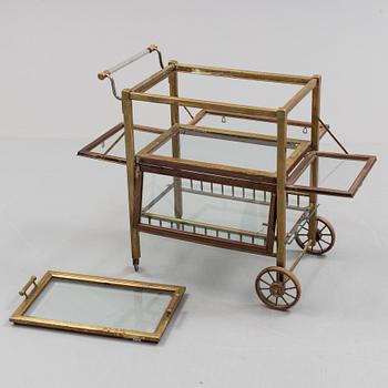 A early brass serving trolley.