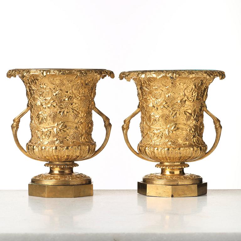 A pair of gilt bronze wine coolers, England, 1825-40.