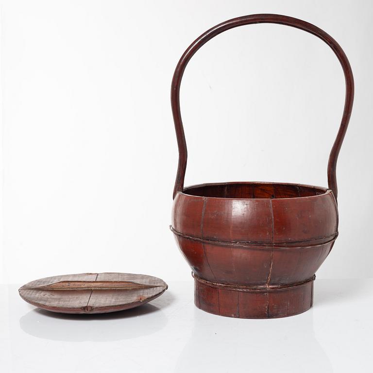 A group of three red wooden vessels, China/Southeast Asia, 20th century.