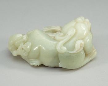 A Chinese nephrite figure of two buddhist lions.