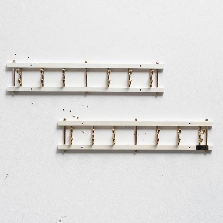 Klädhängare, ett par, "Dekorativ", Skoglunds metallgjuteri, Anderstorp, 1950-/60-tal.