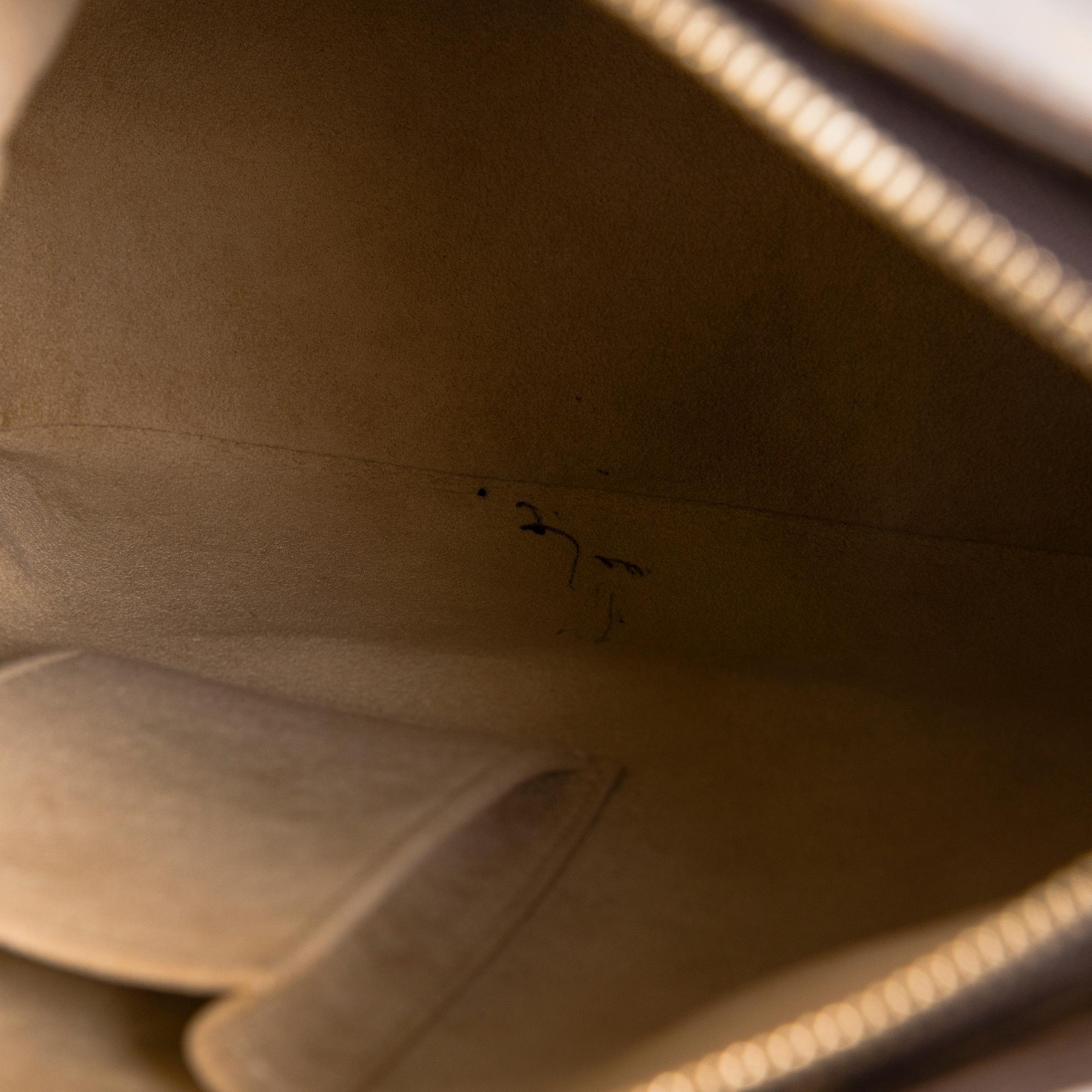 Louis Vuitton, a Monogram Canvas 'Looping GM' bag.