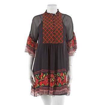 670. ANNA SUI, a black chiffon dress, size small.