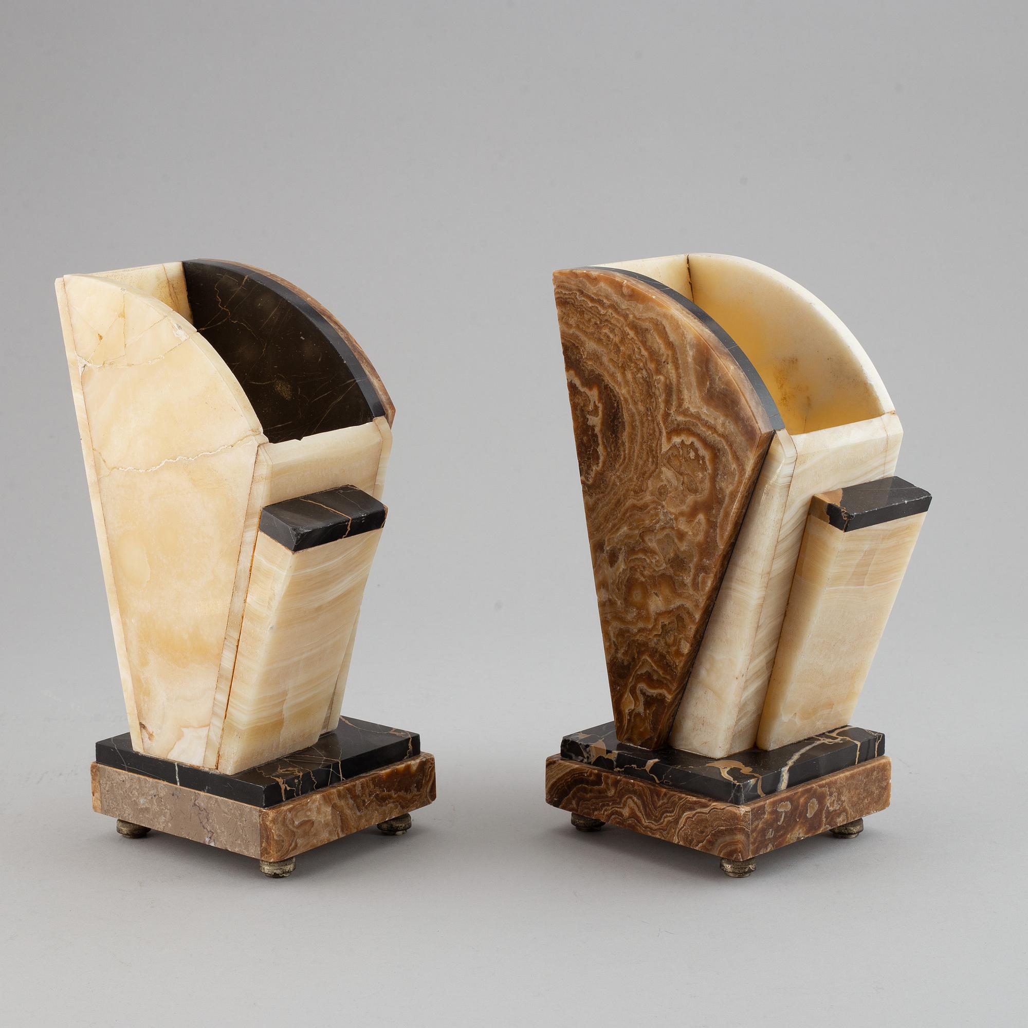 A three piece clock garniture, Art Deco style, 20th Century.