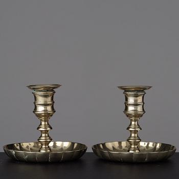 A pair of 18th century candlesticks.