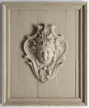 Wall relief, 20th Century, painted plaster & wood.