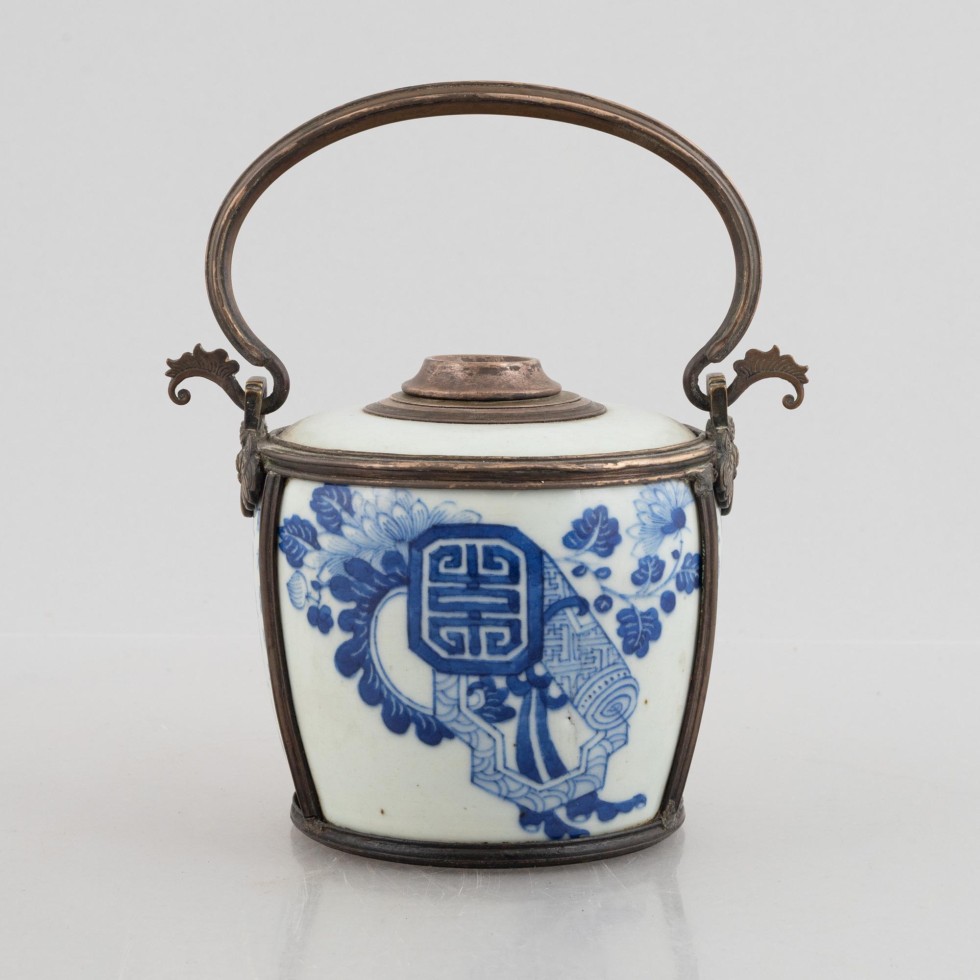 A metal mounted porcelain ewer, late Qing dynasty.