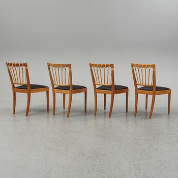 A set of four mahogany and rattan dining chairs, Josef Frank, , model 1165, Svenskt Tenn, Stockholm.