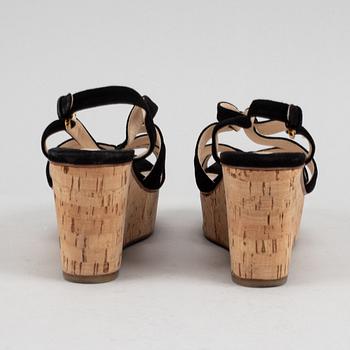 Prada, a pair of black suede wedge sandals, size 39½.
