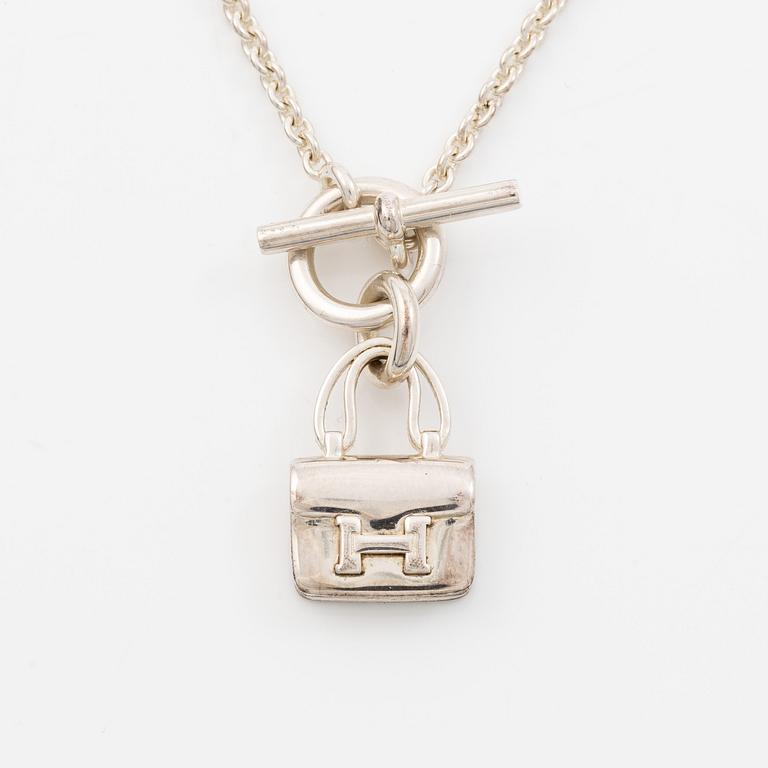 Hermès, Necklace / collar with charm, "Amulettes Constance", silver 925.