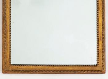A Gustavian mirror, late 18th century.