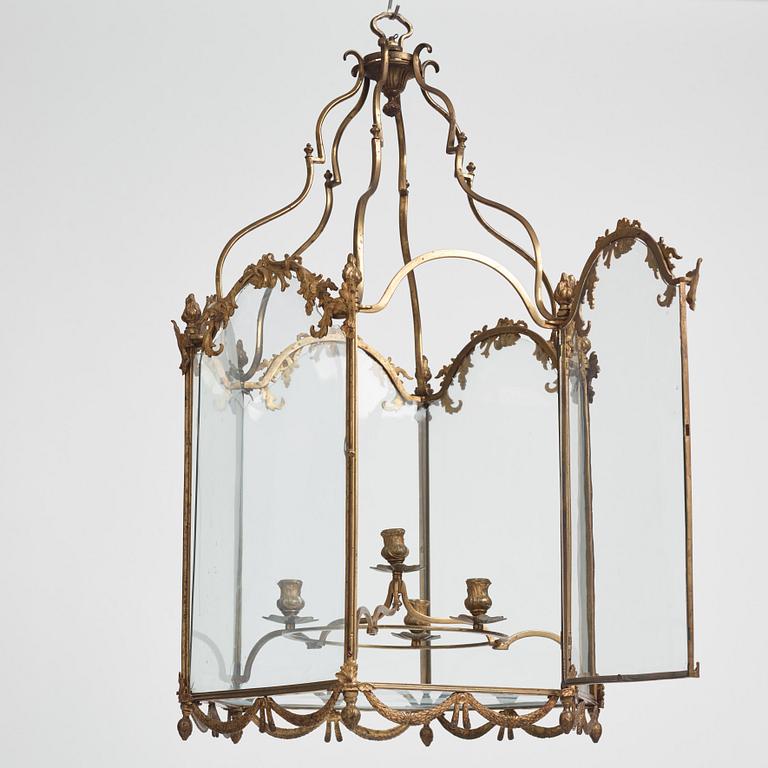 A Swedish rococo gilt-brass four-light lantern, possibly a masterpiece, Stockholm, later part of the 18th century.