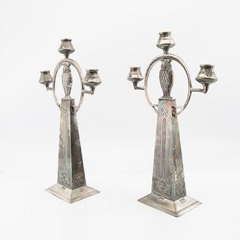 Candelabras, a pair by WMF (Württembergische Metallwarenfabrik), early 20th century, nickel silver.