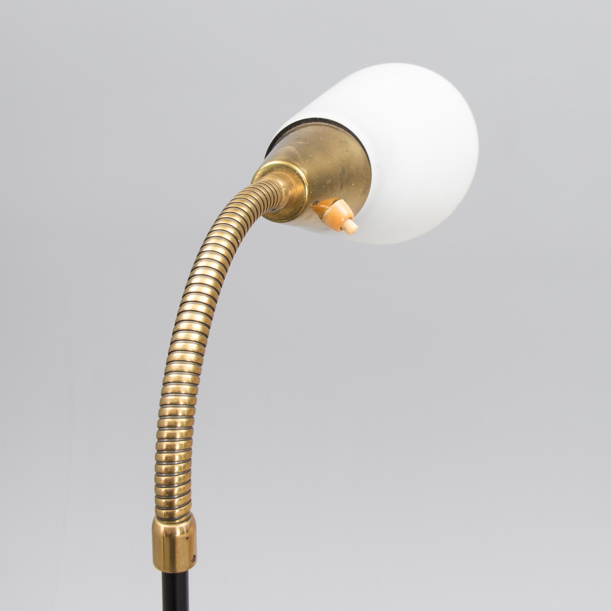 A mid 20th century floor lamp, marked AJH.7.