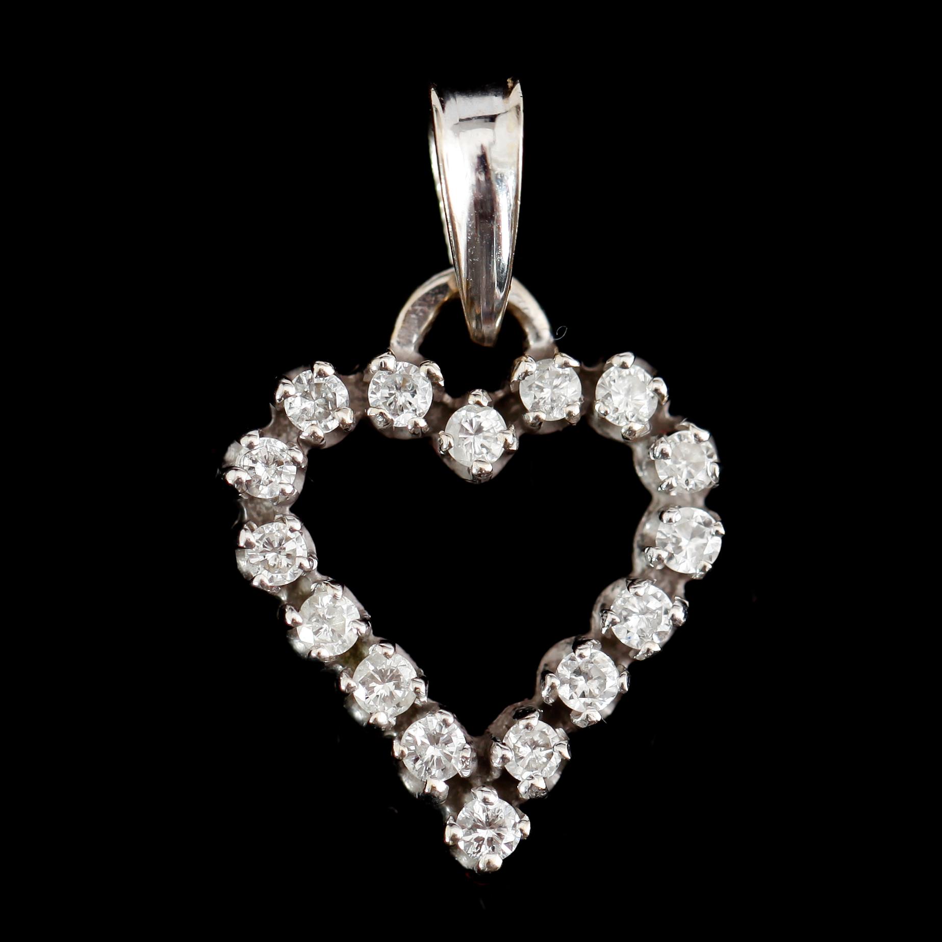 HÄNGE, 18 k vitguld med briljantslipade diamanter.