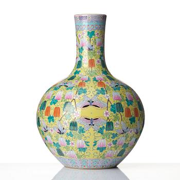 A large Chinese famille rose yellow ground vase, 20th Century with Qianlong mark.