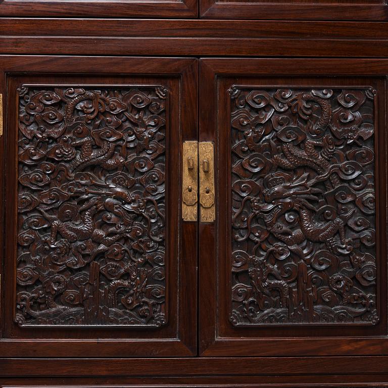 A pair of Chinese hardwood cupboards, late Qing dynasty (1644-1912).