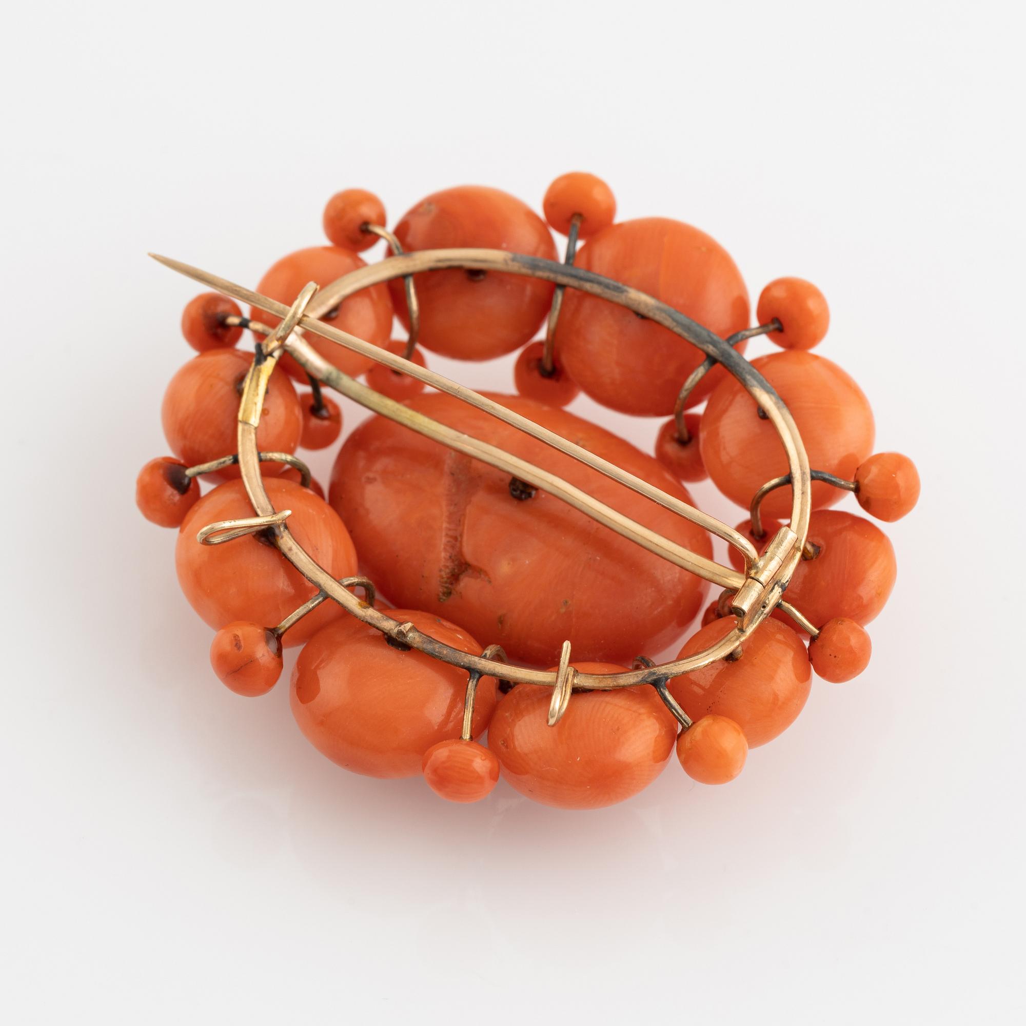 Coral brooch.